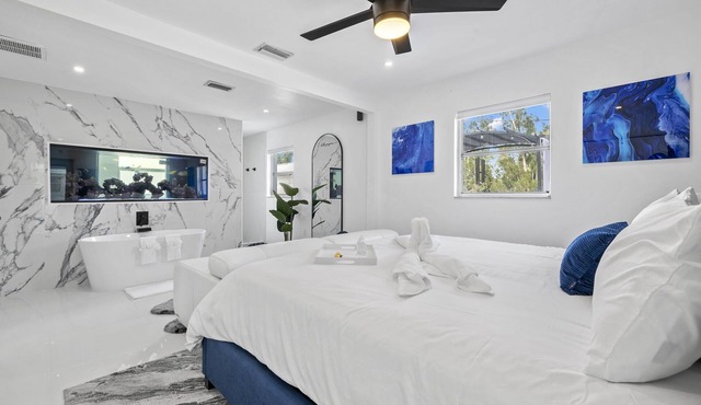 Luxury family friendly WATERFRONT home with a POOL, PLAYGROUND, FIREPIT & BEACH
