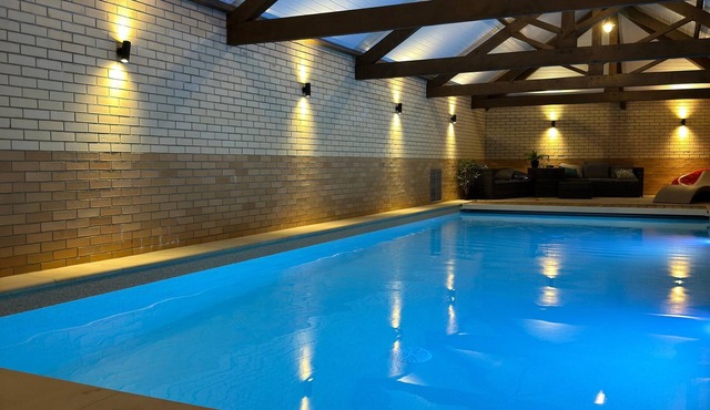 Luxury Farm House in its surounding land with scenic views of lakes and fields