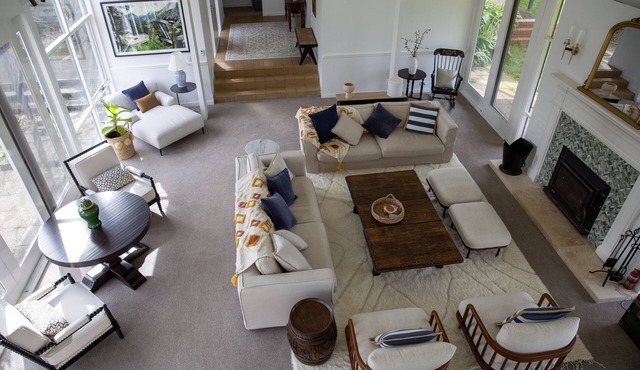 Luxury Farmhouse on a lake with a pool and bar.