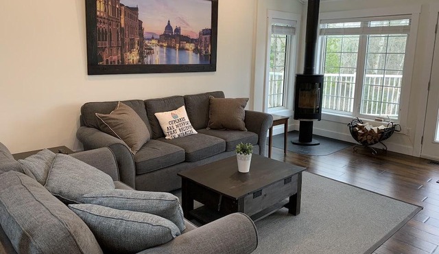 Luxury four-season cottage with sauna, private water access, boat dock