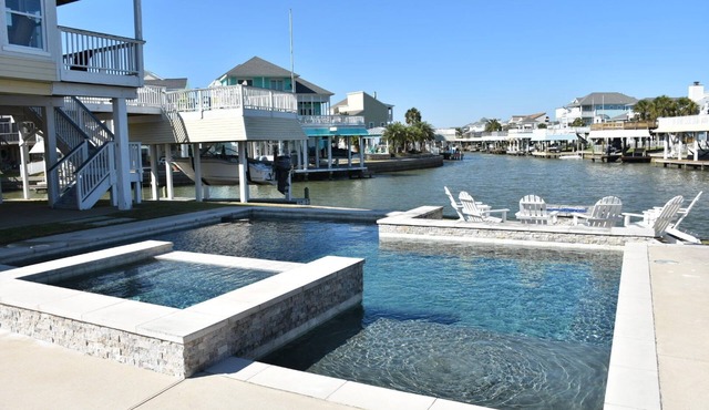 Luxury Galveston Waterfront Escape – Amazing Pool, Spa & Canal Views!
