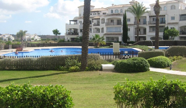 Luxury Ground Floor Apartment beside a large Pool complex and private garden.