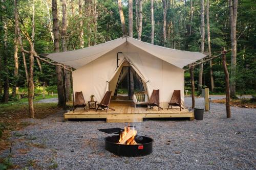 Luxury Group Safari Tent Complete with Firepit and Patio, Perfect for a Weekend Escape to the Adirondacks