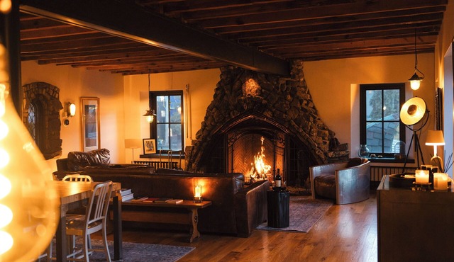 Luxury + History next to US Bank Stadium. Private Sauna + Courtyard + Rooftop.