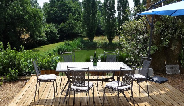 Luxury holiday home escape, set in an acre of private garden with its own lake