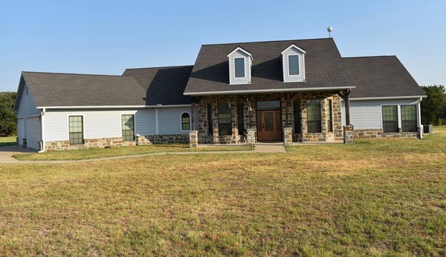 Luxury Home in Peaceful Country! 4 Bed 3.5 Bath, complete w view of stocked Pond