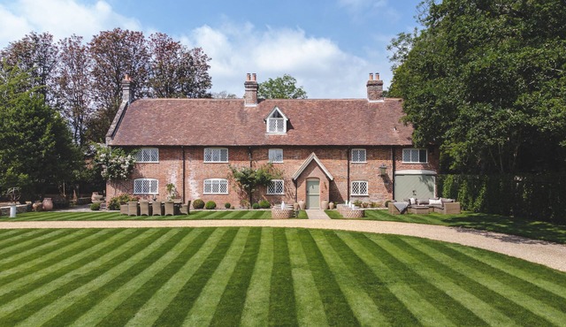 Luxury home in the New Forest featuring a year-round heated swimming pool.