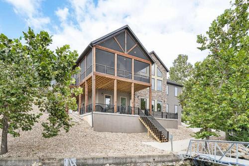 Luxury Home on Cove with Boat Slips, Waterslides, and Jump Deck