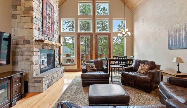 Luxury home on the golf course with spacious deck overlooking the mountains