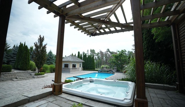 "Luxury Home with Pool and Outdoor Bar"