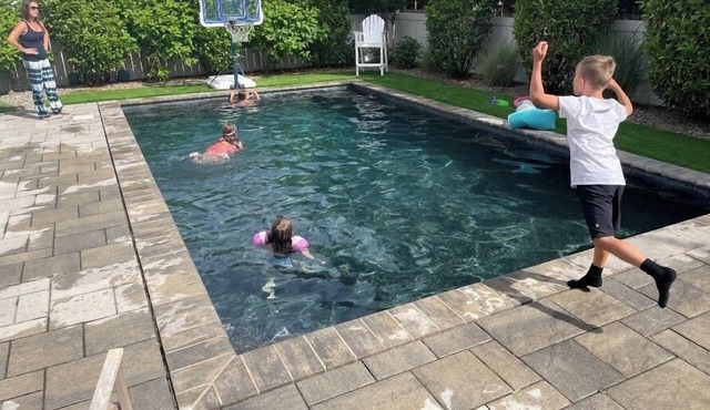 Luxury Home with Heated Pool, elevator & Steps to the beach with Ocean views!