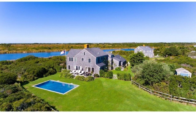Luxury home with pool, water views & walk to beach