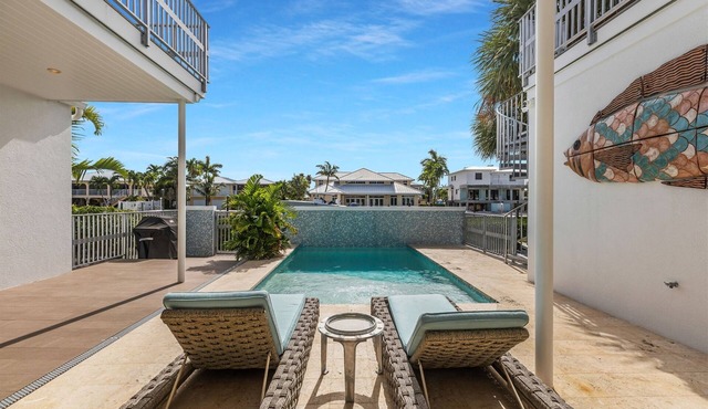 Luxury Key Colony Beach Home | Coral Pool, Rooftop Deck + Ocean Access Dock