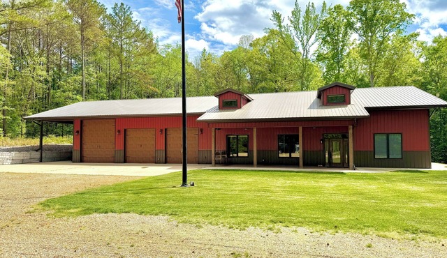 Luxury KY Lake Home. Pristine 5 bed/5 bath retreat set in acres of gated privacy