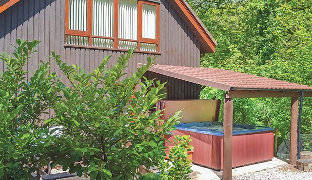 Luxury lodge residing at the top of the wooded valley.