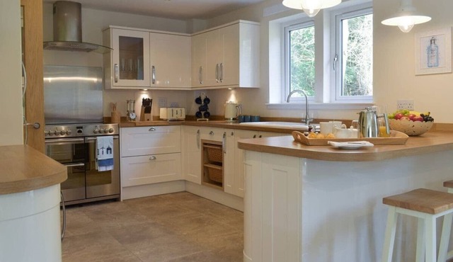 Luxury lodge, set in 40 acres of beautiful private gardens at Carberry Tower Estate.