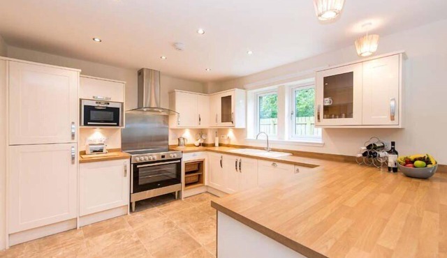 Luxury lodge, set in 40 acres of beautiful private gardens at Carberry Tower Estate.