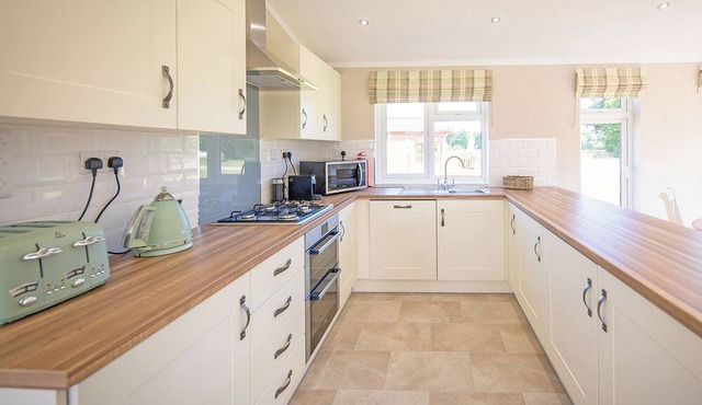 Luxury lodge with one double with freestanding bath.