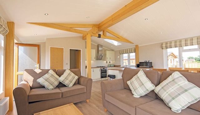 Luxury lodge with one double with en suite shower and one twin.