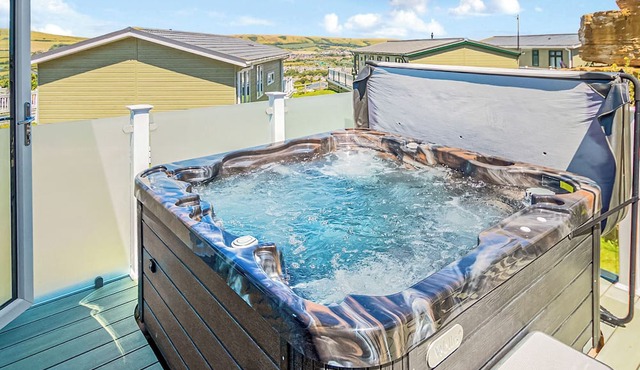 Luxury lodge with one double with en suite shower and one twin.