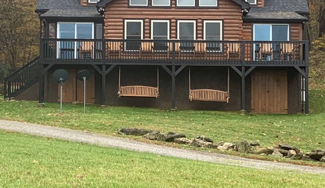 Luxury Lodge with stream in backyard