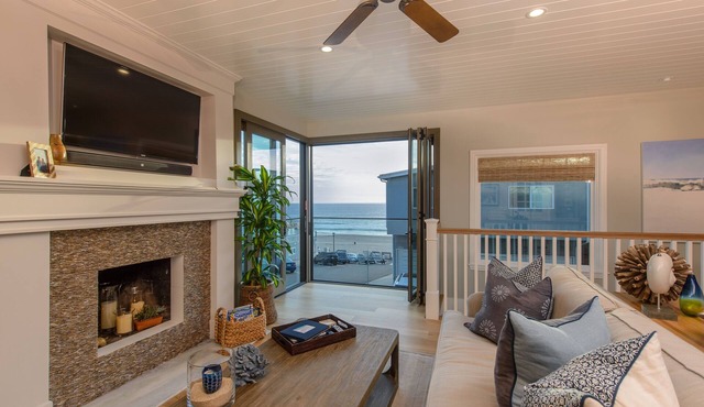 Luxury Manhattan Beach Home Steps from the Sand + Rooftop Deck