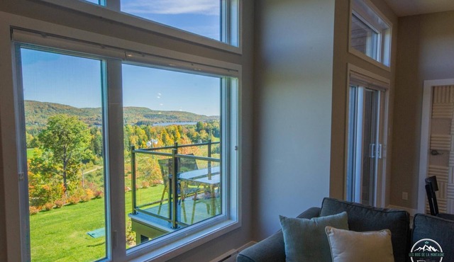 Luxury mountain condo with golf and slide views