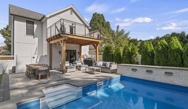Luxury Oasis: Heated Pool + Walk to Town/Track