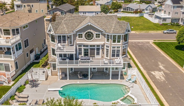 Luxury Ocean Front Mansion with Heated Pool, Elevator, Grill and Suites Galore
