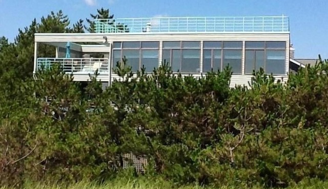 Luxury oceanfront home with hot tub and baby grand piano.