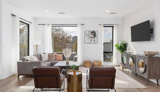 Luxury on the River - Walk to Downtown, 2 Private Patios & Garage Parking