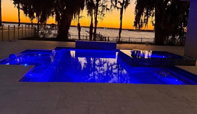 Luxury, peaceful and beautiful waterfront home w/pool hot tub and lots of space