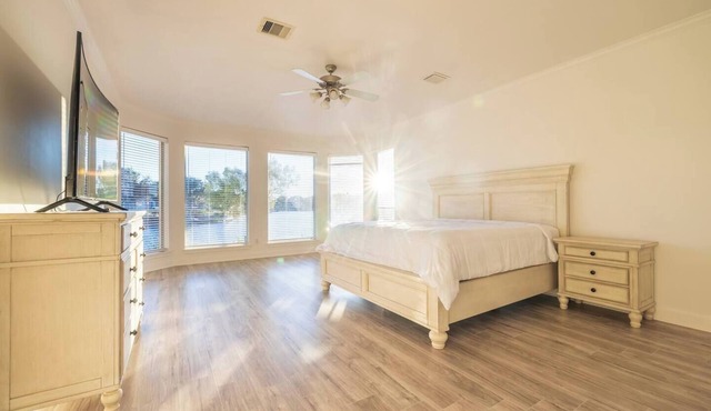 Luxury resort style living area with spectacular water view house located in Missouri City