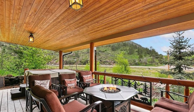 Luxury Riverfront Cabin Near RMNP with Hot Tub, Fire Pit, and Mountain Views