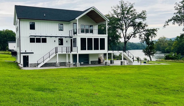Luxury Riverfront Home Getaway with Hot Tub