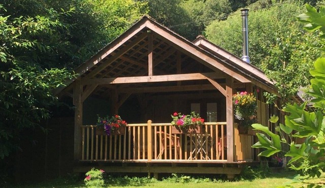 Luxury riverside lodge with covered terrace