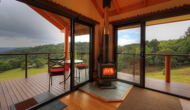 Luxury self-contained villa with king bed, double spa, fireplace, and kitchen.