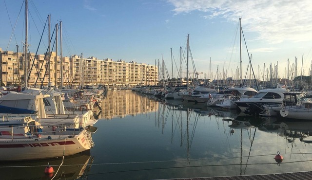 Luxury standing feet in the water.