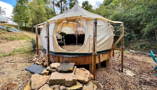 Luxury stargazing waterfront glamping tent