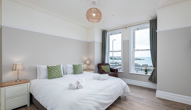 Luxury Ty Glas Beach House sleeps 22 across 11 ensuite rooms with indoor Swimspa