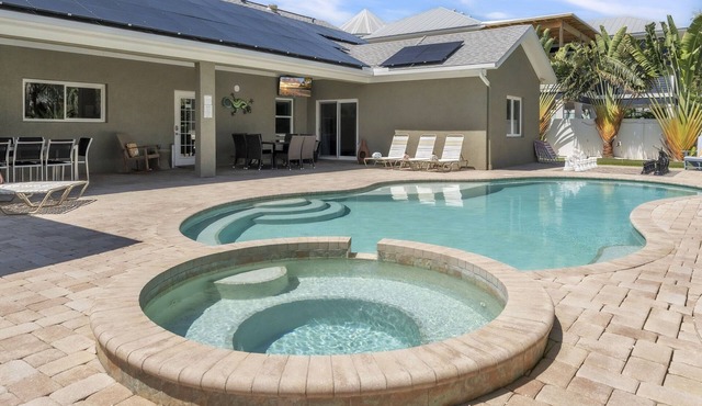 Luxury Villa · Heated Saltwater Pool & Spa · Steps to Beach