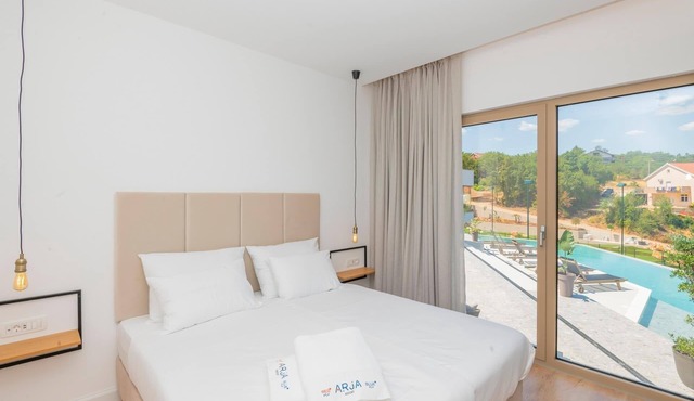 Luxury Villa Red heated pool, sauna, tennis court, mini golf, stylish, family, panoramic view