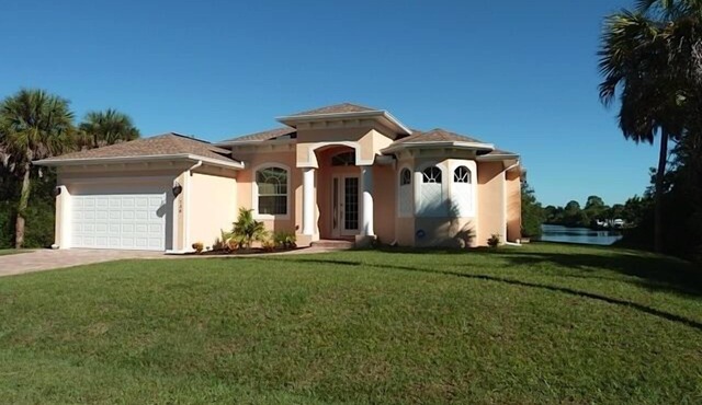 Luxury villa with waterfront, boat dock and heated pool!
