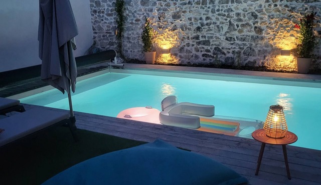 Luxury Villa with Year-Round Comfort and Saltwater Pool in Prime Location