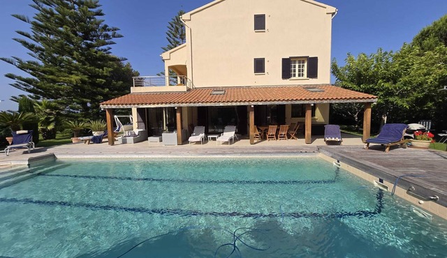 Luxury villa with pool by the sea.