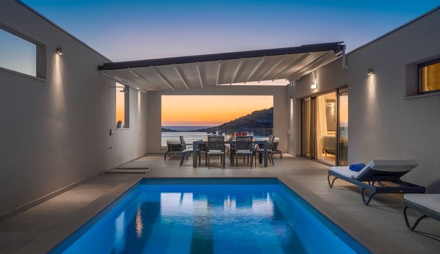 Luxury villa with heated private pool. Beach 20 m from villa, amazing view