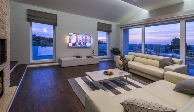 Luxury villa with infinity swimming pool, outdoor jacuzzi and garden