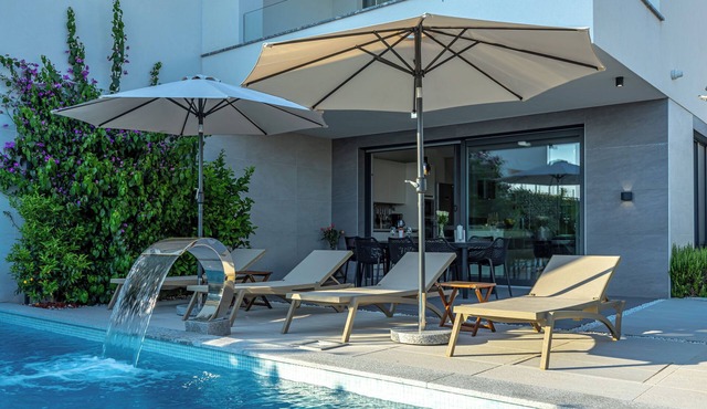 Luxury villa with open sea view and its own multi-purpose sports ground