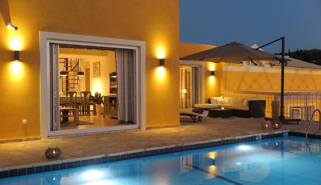 Luxury villa with private swimming pool and sea and sunset views