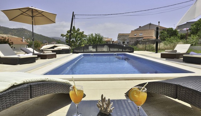 Luxury villa with private heated pool and sea view 5